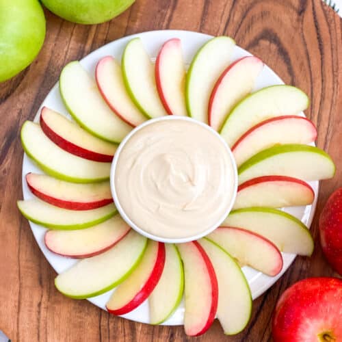 apple dip on a plate with apples, apples on the side