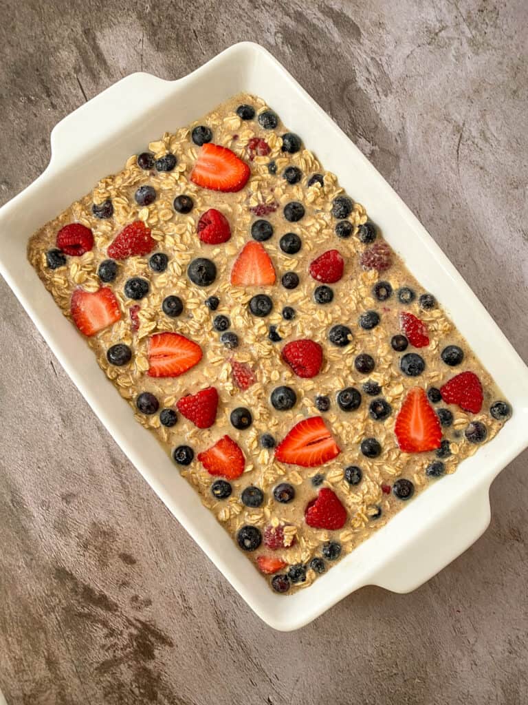 the baked oatmeal in a pan ready to be baked