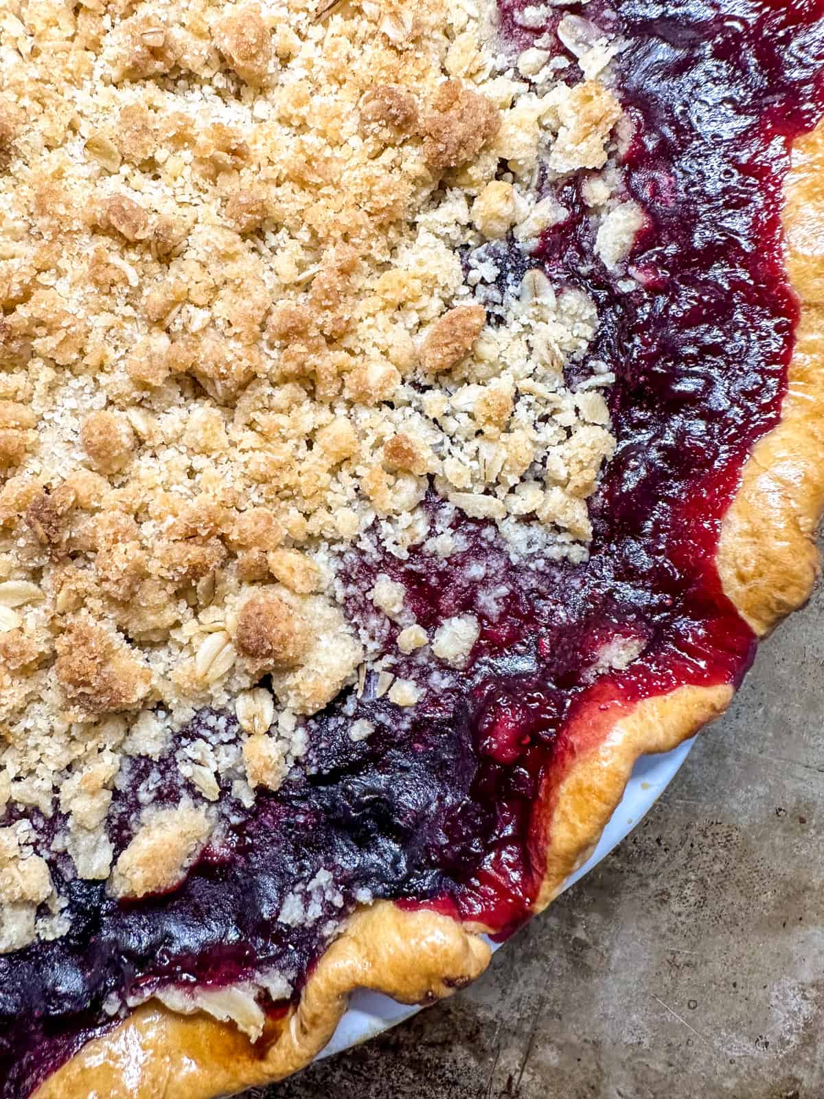 close up of the edge of the mixed berry pie